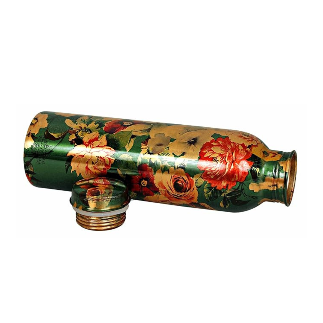 Indian Art Villa floral copper water bottle lying on its side
