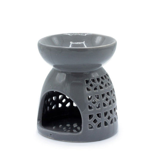 Ceramic oil burner with moroccan cut out pattern