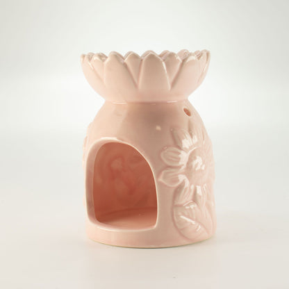 Side view of ceramic pastel pink sunflower oil burner