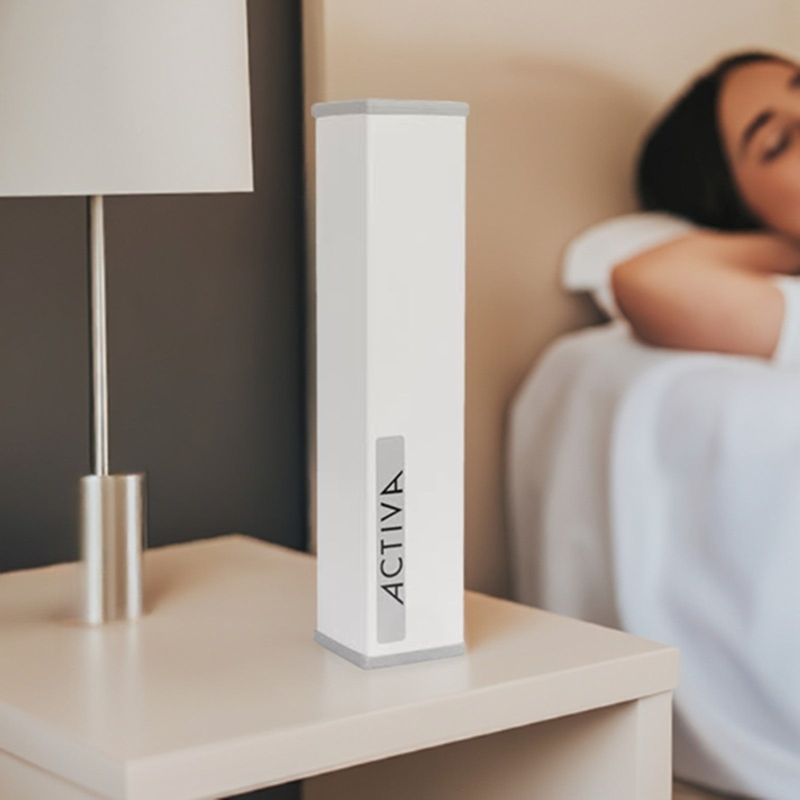 Geomack Activa EMF harmoniser on a bedside table