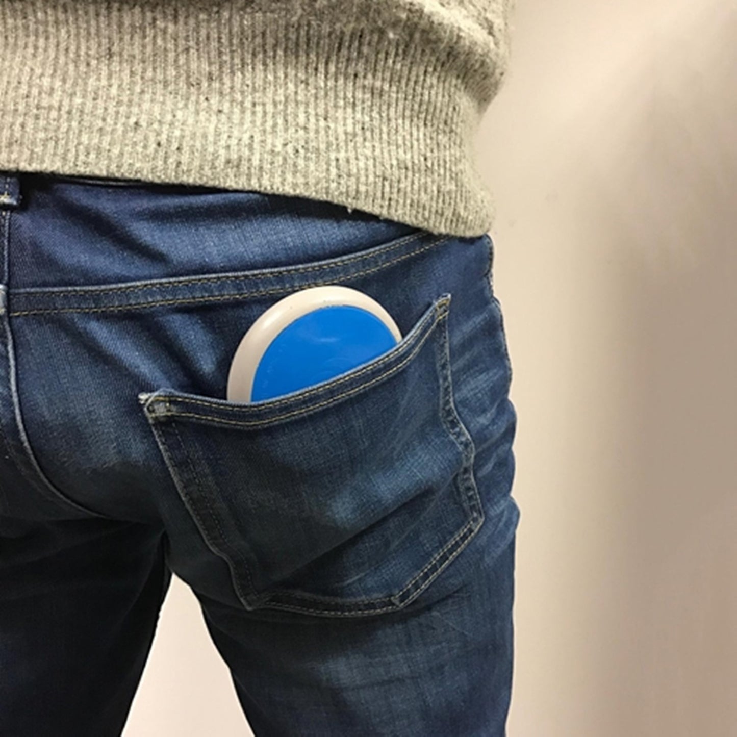 Geomack G-Oyster EMF harmoniser carried in a pocket