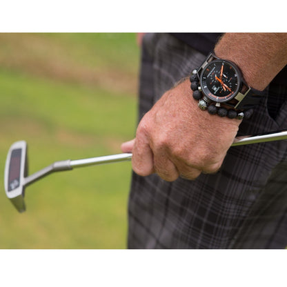 Playing golf with Zen-Z Karma Lava Mudrock Magnetic Bracelet
