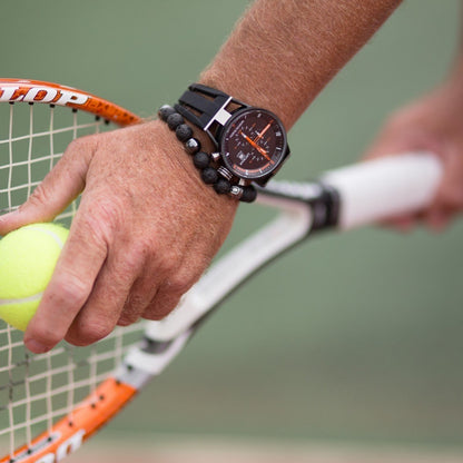 Playing tennis with the Zen-Z Karma Lava Mudrock Magnetic Bracelet